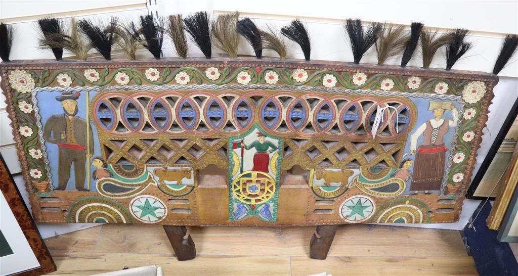 An Eastern European folk art carved and painted wood dog cart wedding gift, 72cm x 108cm